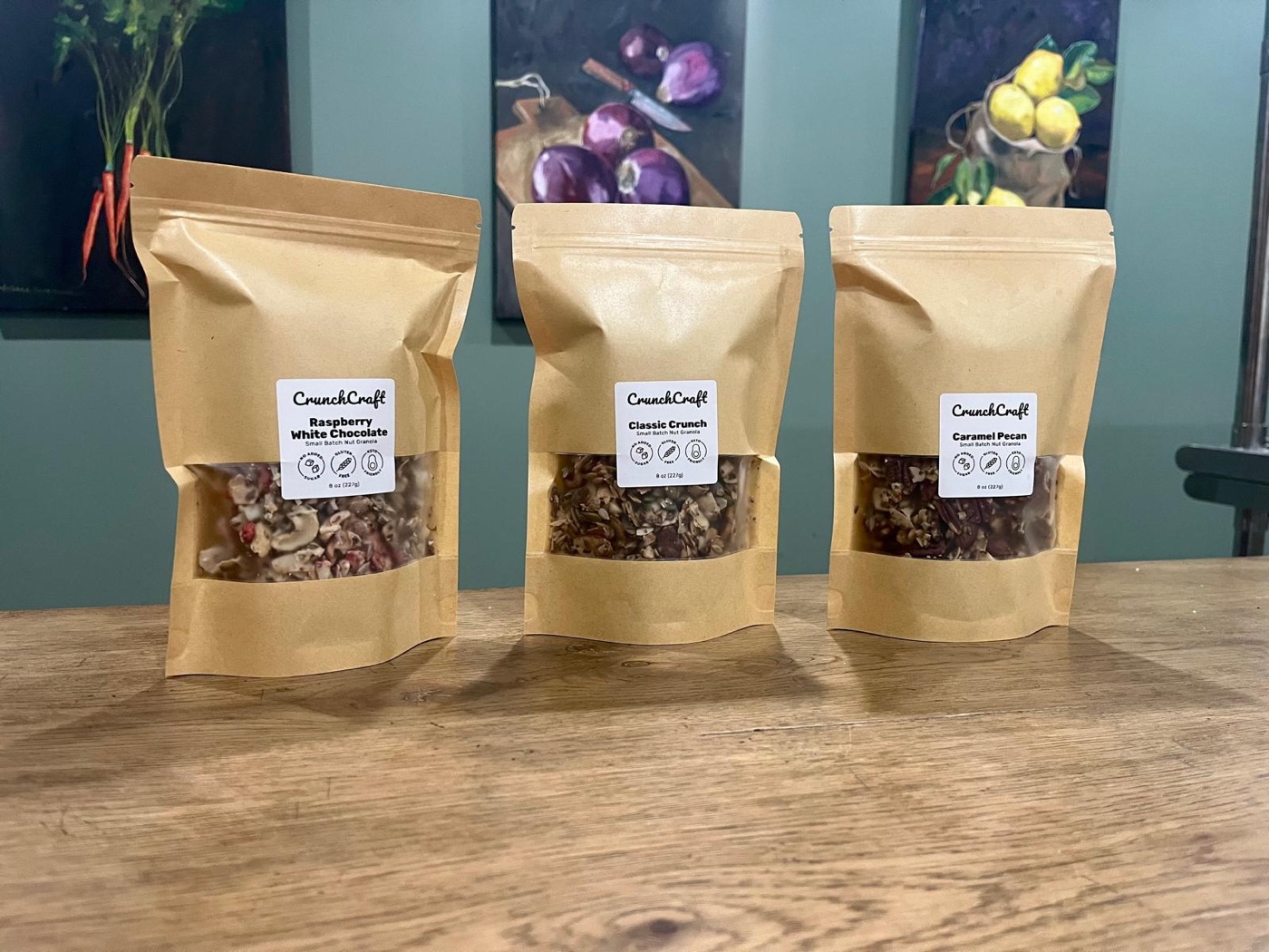 Three bags of CrunchCraft in a row on a table